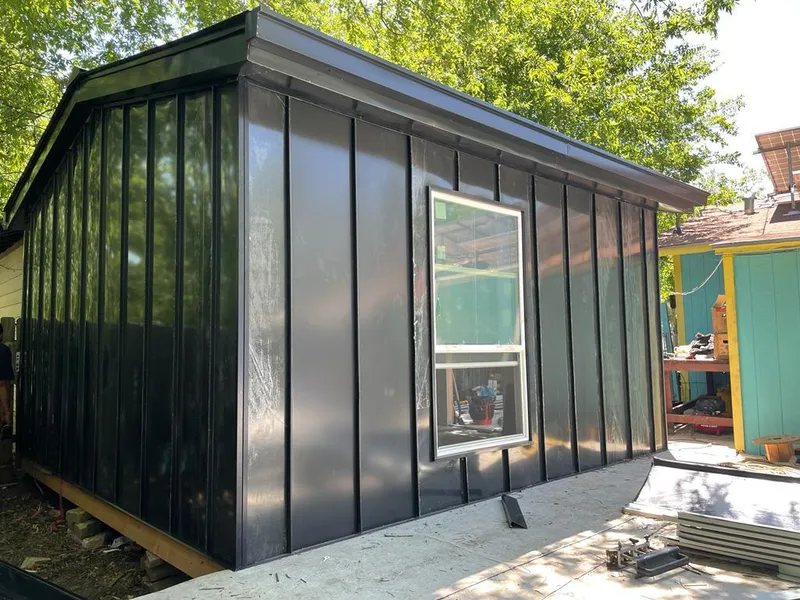 Black standing seam metal wall panels for Roof Inspection in Jeffersonville