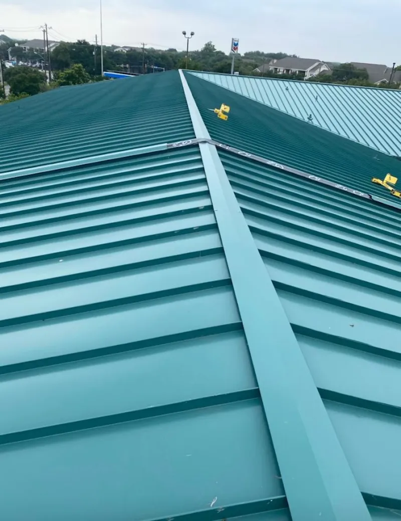 Green commercial metal roof ridge and valley for Metal Roof Repair in Jeffersonville