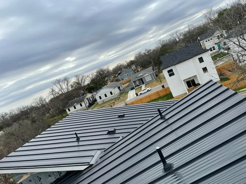 Standing seam metal roof panels with vents for Skylight Repair in Jeffersonville